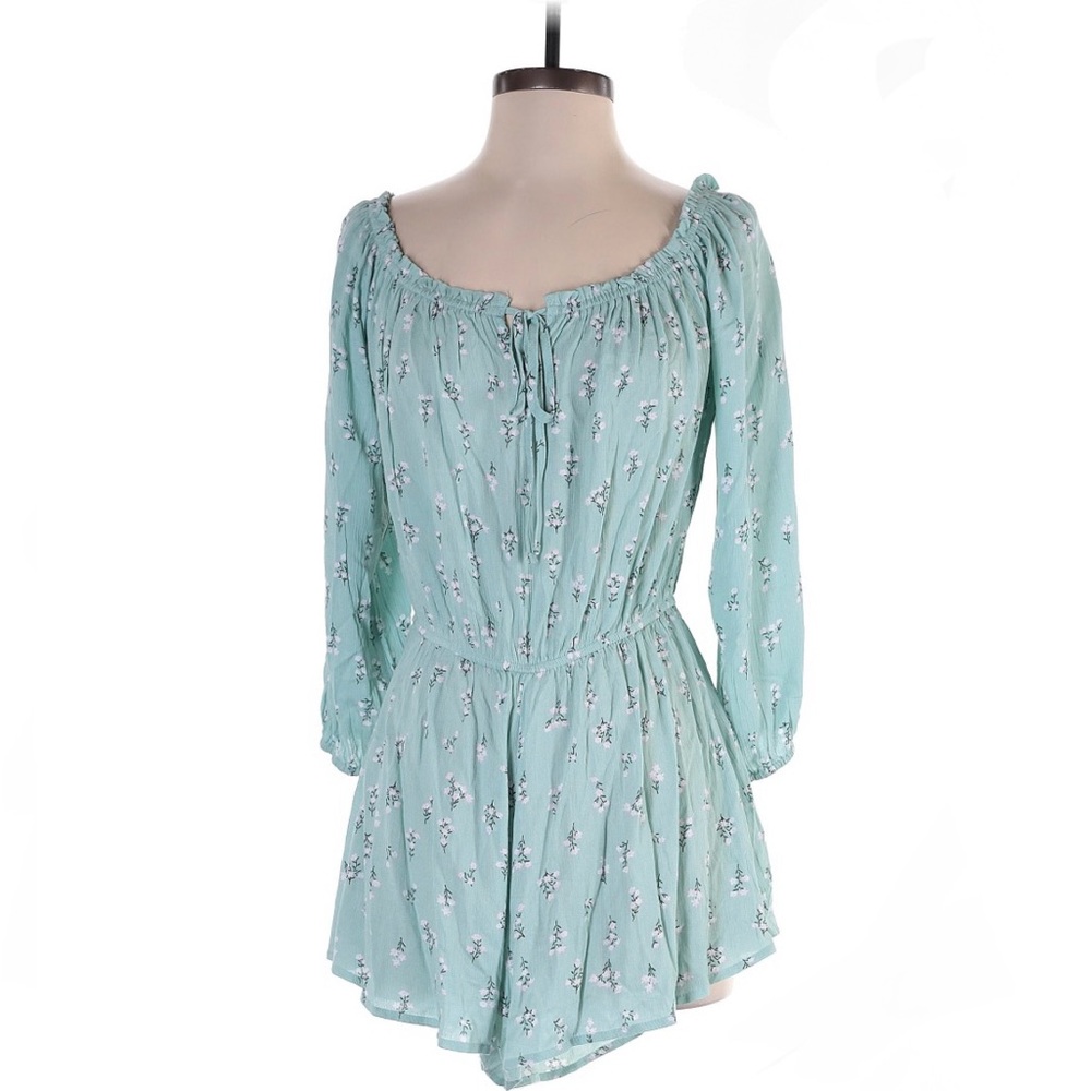 Light blue long sleeve floral romper womens size medium elegant stretch fabric
